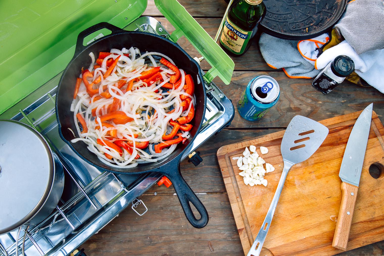 A cast iron skillet on a camping stove