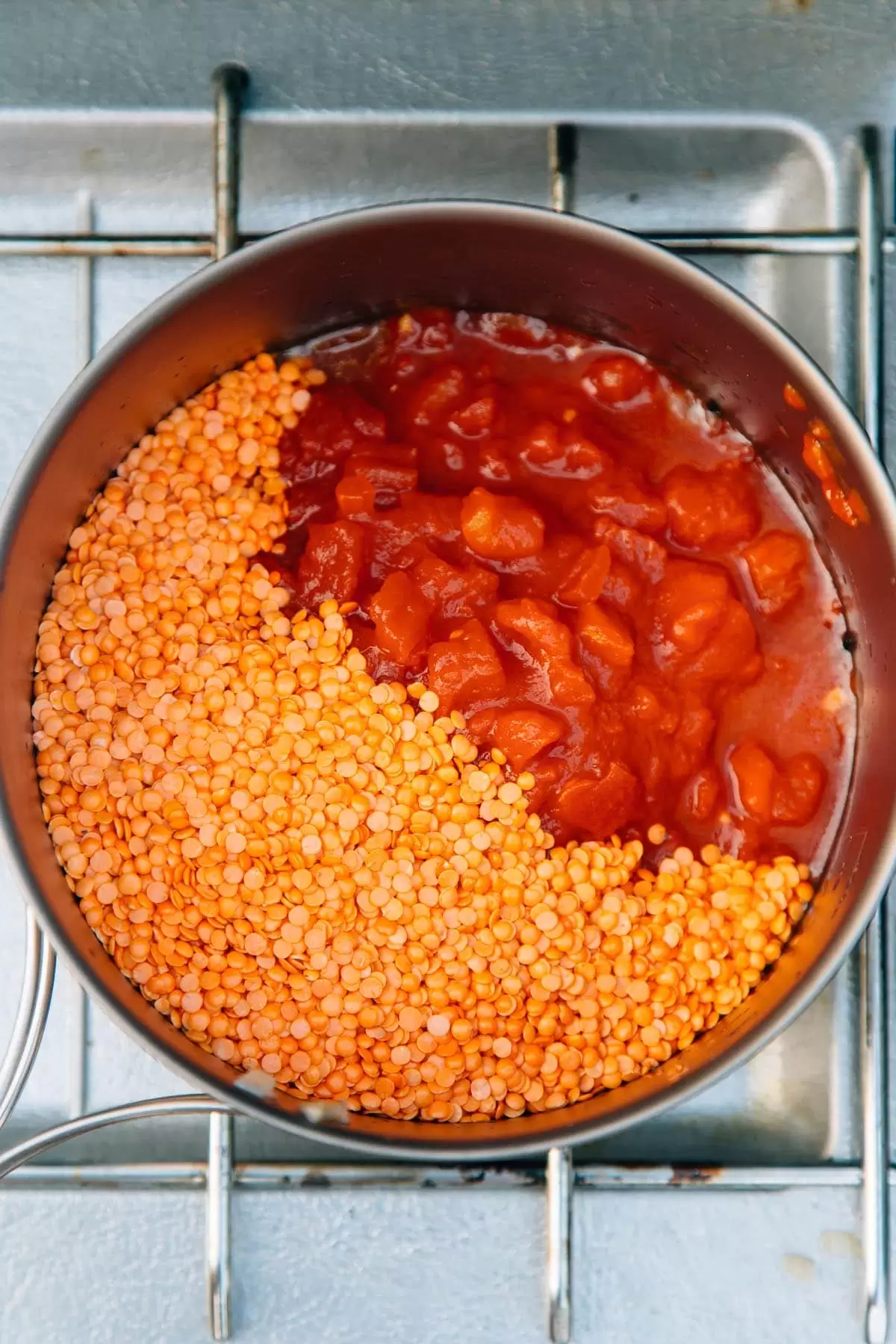 Red lentils and tomatoes in a pot
