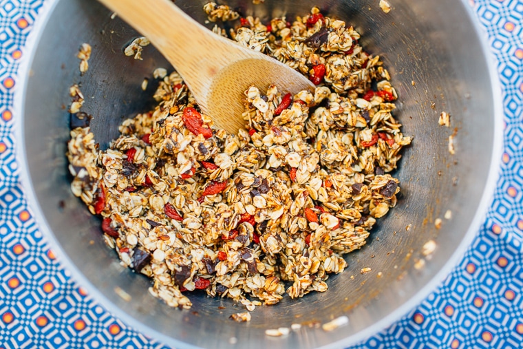 Ingredients for homemade granola bars in a mixing bowl