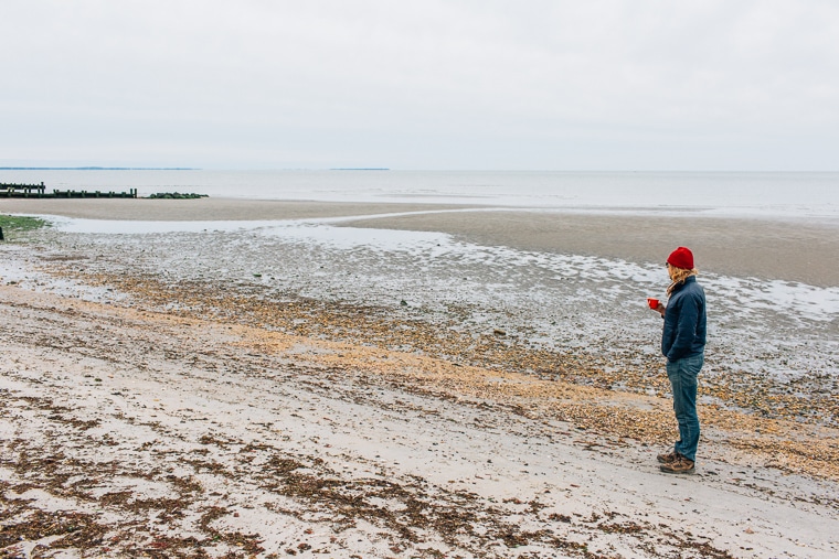 Michael standing on a beach in winter