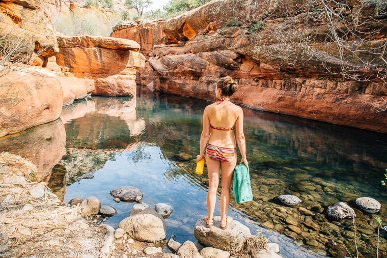 Megan in a bathing suit at a swimming hole in Sedona