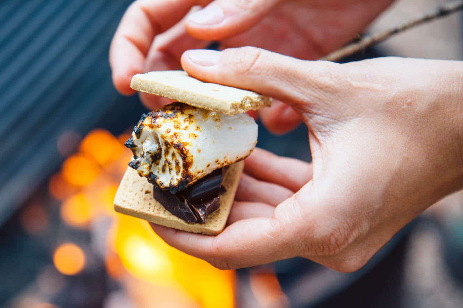food on a camping trip Megan making s'more's