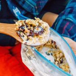 A spoonful of granola and milk
