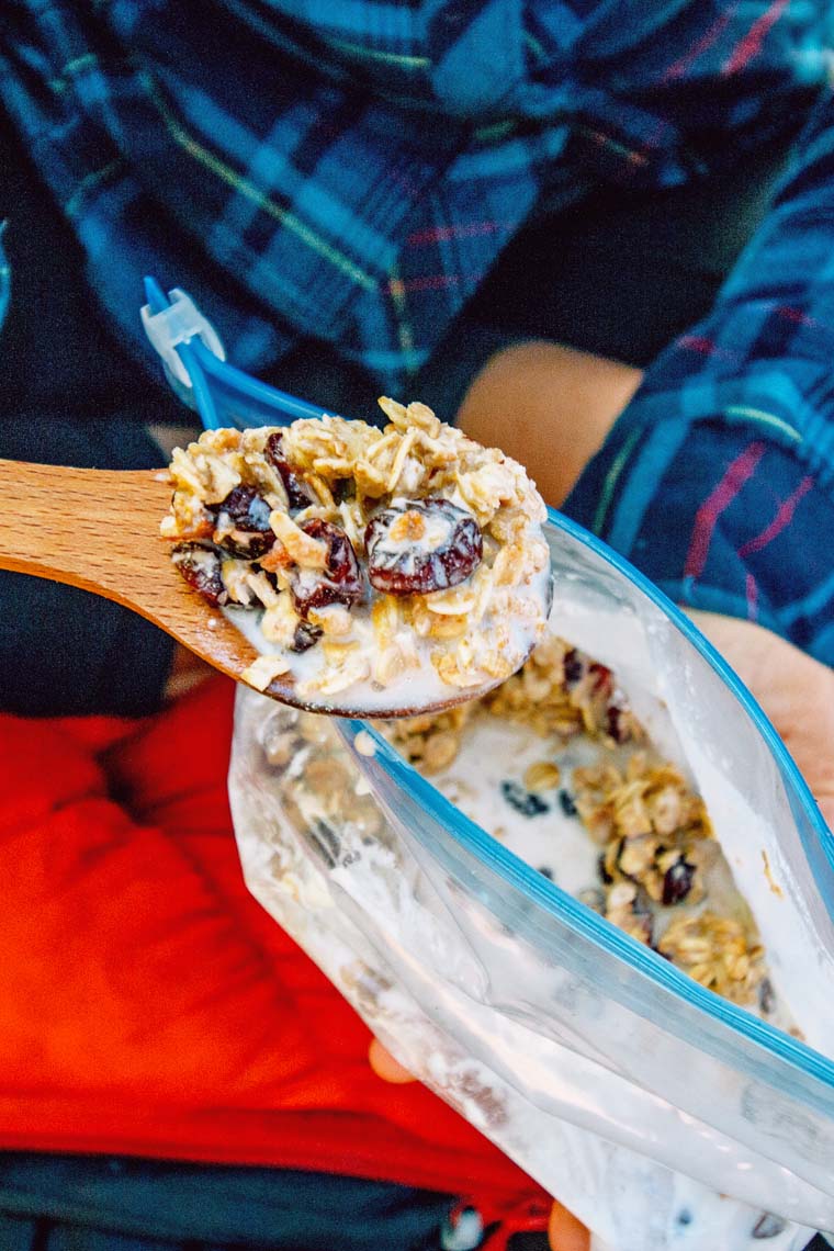 A spoonful of granola and milk