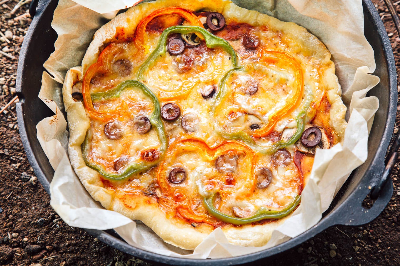 Make pizza night a new camping tradition! Learn how to make Dutch Oven Pizza while camping using just a few simple ingredients.