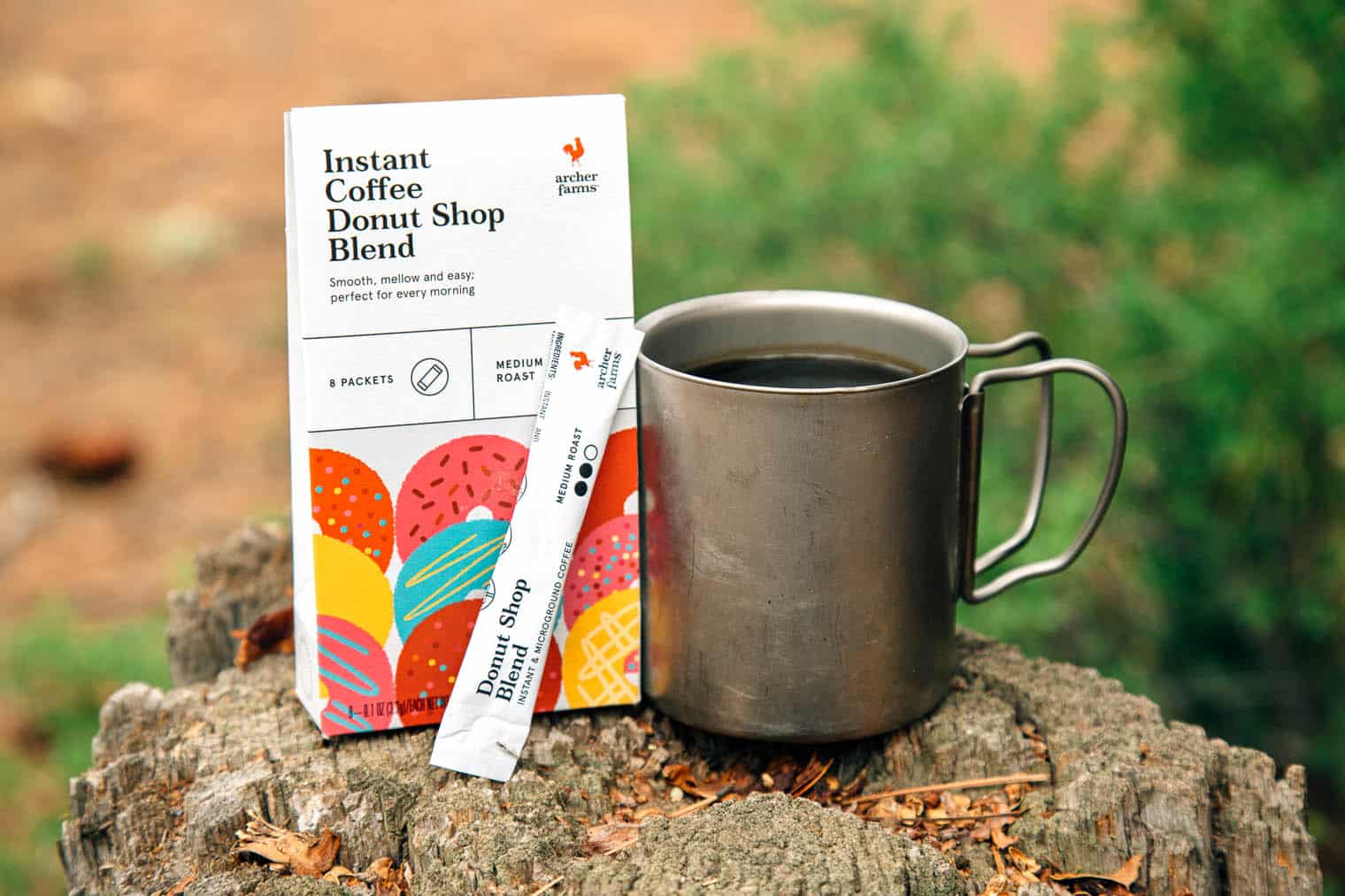 Target Archer Farms instant coffee packaging next to a camp mug