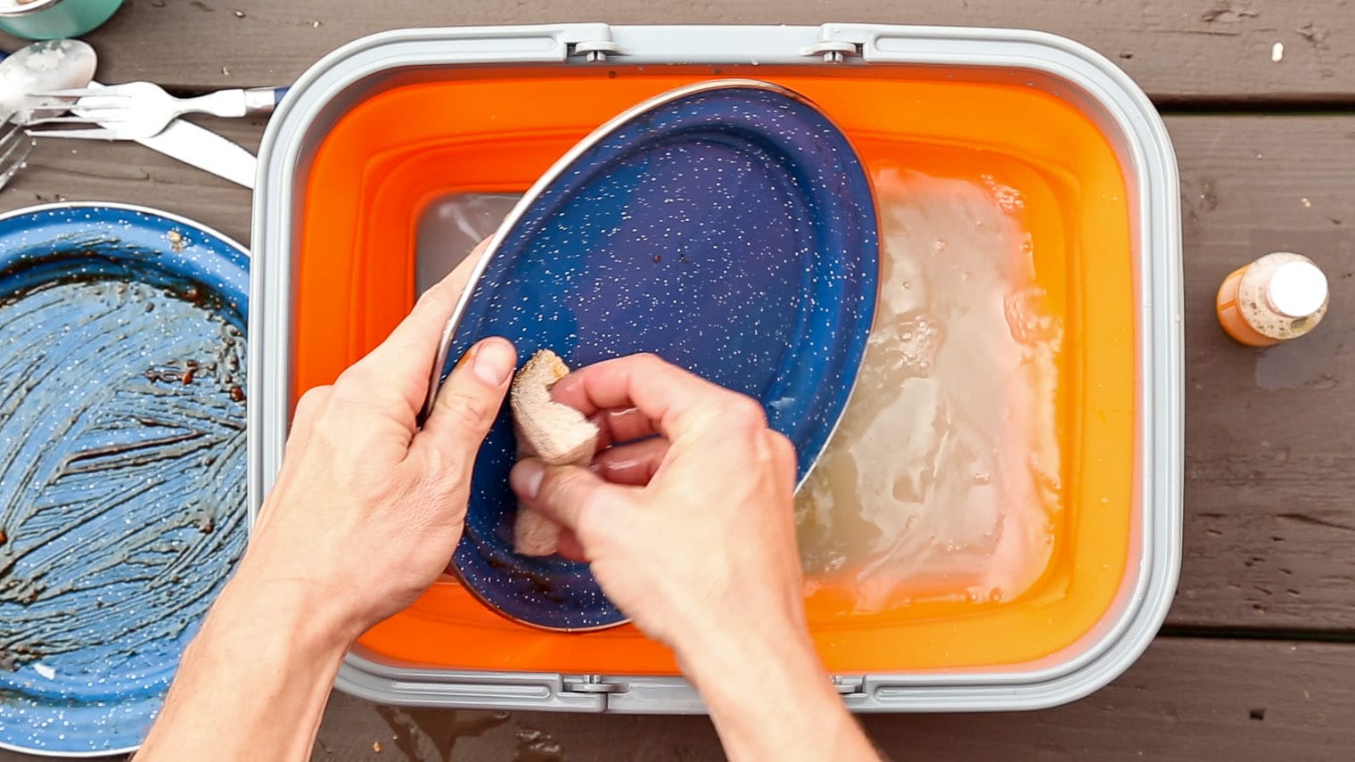 How to wash dishes while camping using the three bucket method.