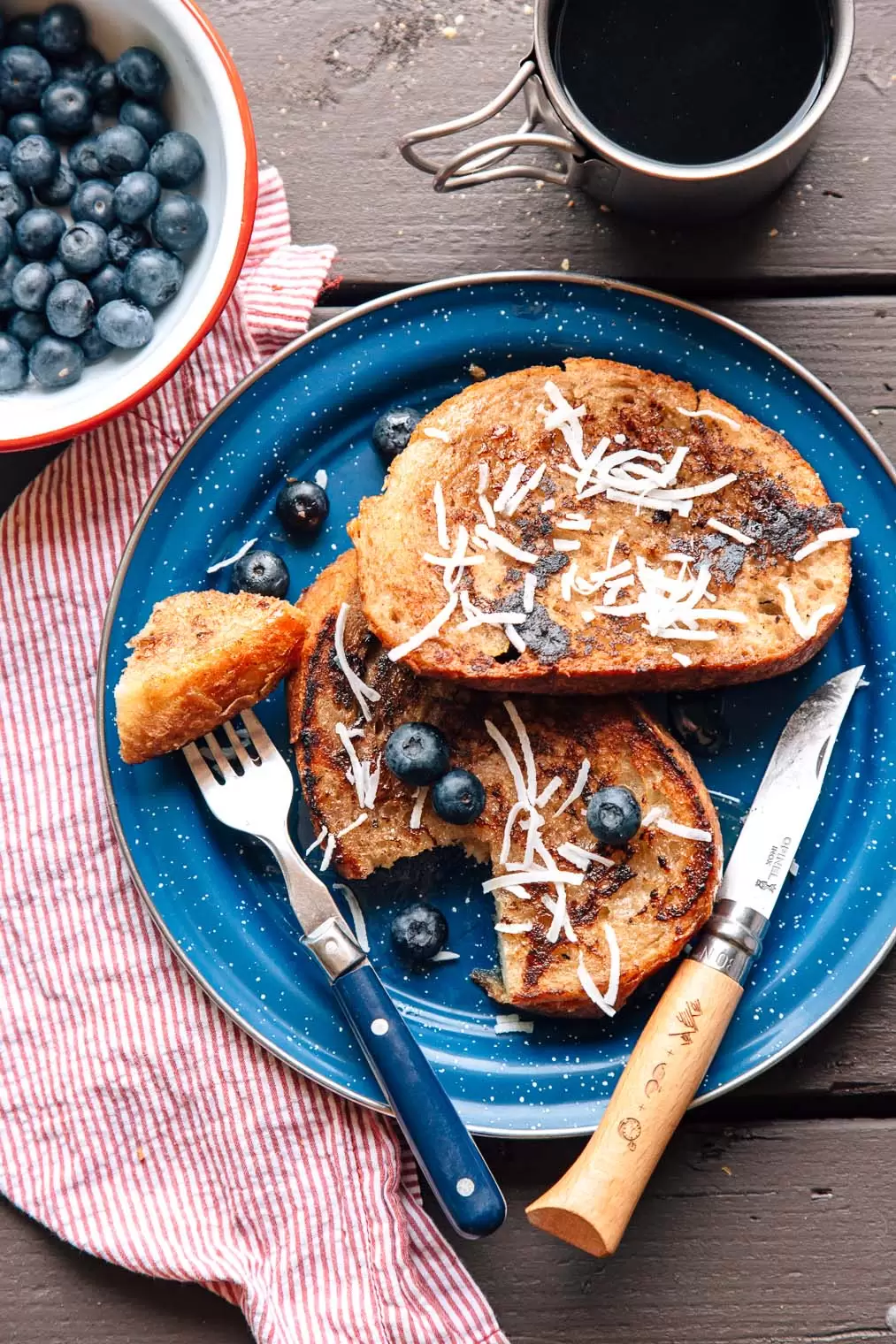 Vegan Coconut French Toast in a skillet on a camping table.