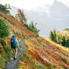 Woman hiking in the Cascade Mountains with fall foliage
