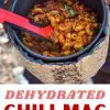 Pinterest graphic with text overlay reading "Dehydrated Chili Mac make your own backpacking food"