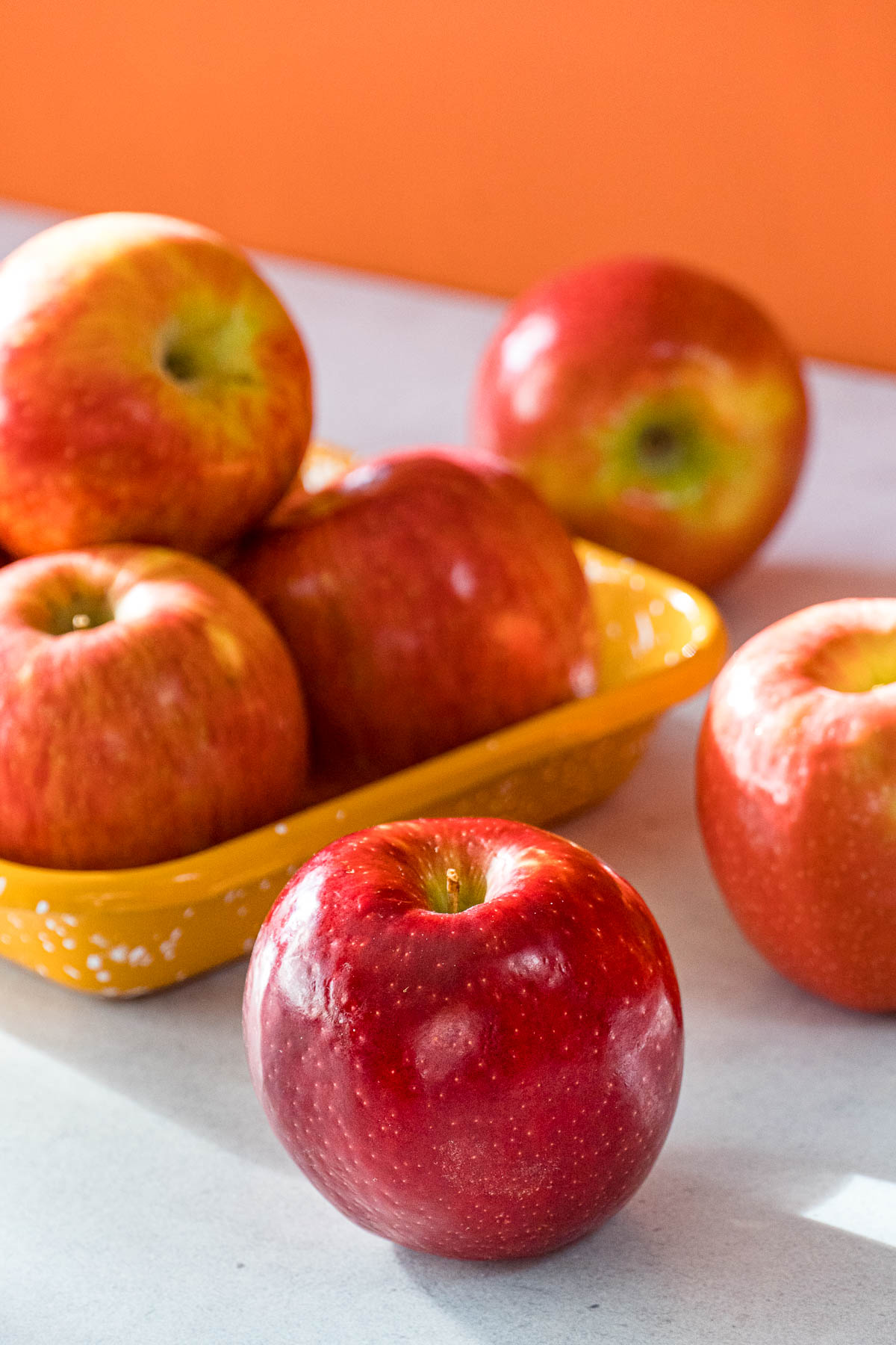 Various types of apples on a counter