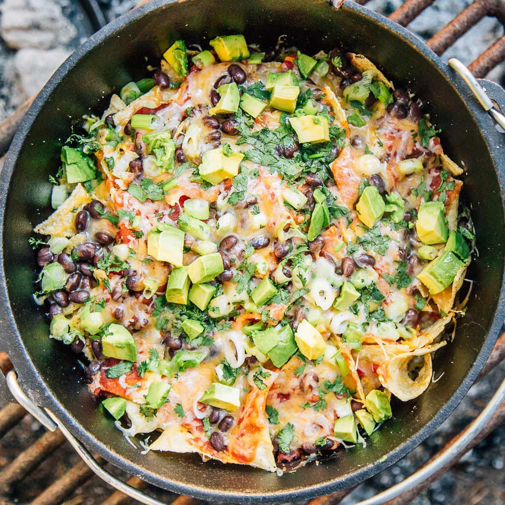 https://www.freshoffthegrid.com/wp-content/uploads/Campfire-Nachos-Dutch-Oven-Camping-Recipe-sq.jpg