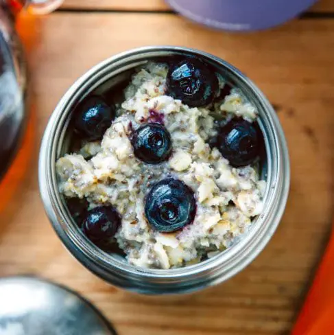 Oatmeal with blueberries in a thermos jar
