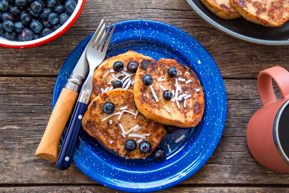 Three slices of French toast on a blue plate