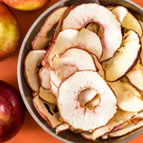 Dried apple chips in a bowl