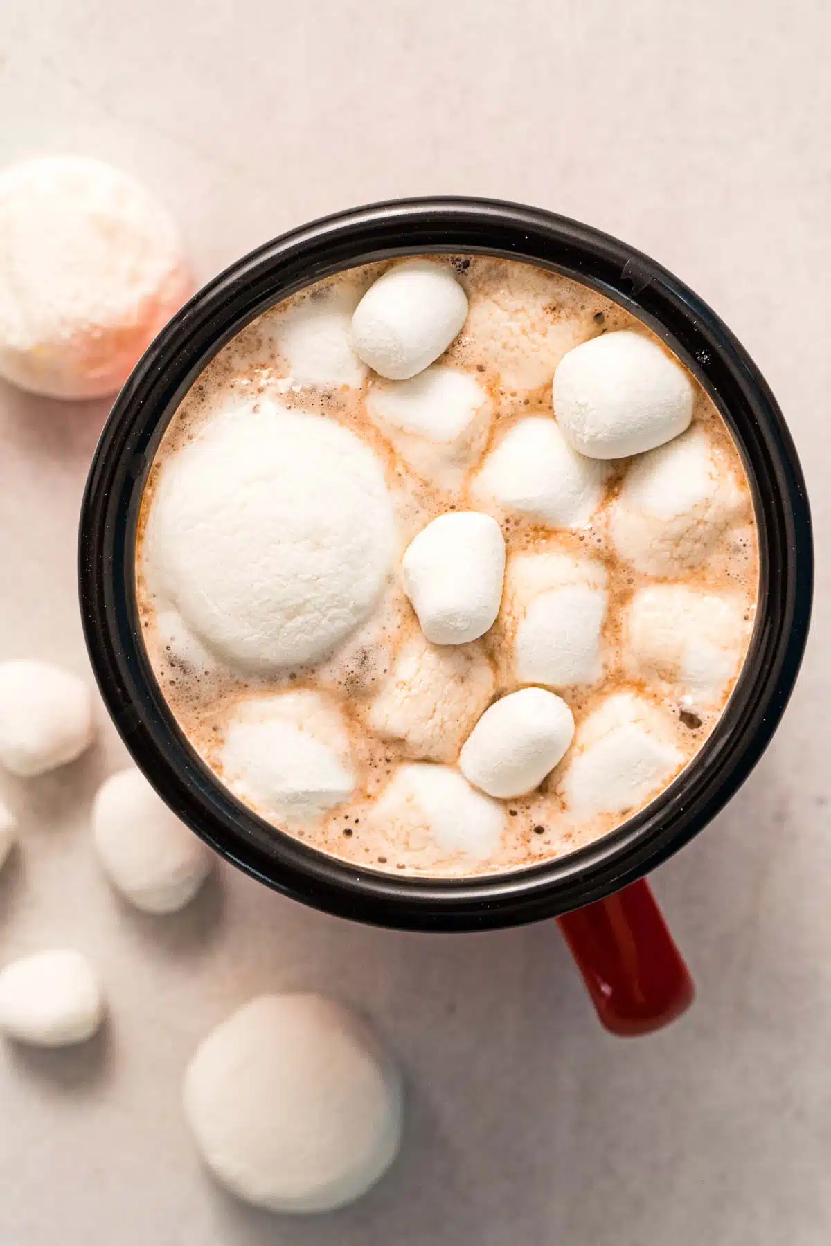 Dehydrated marshmallows in a mug of hot cocoa.