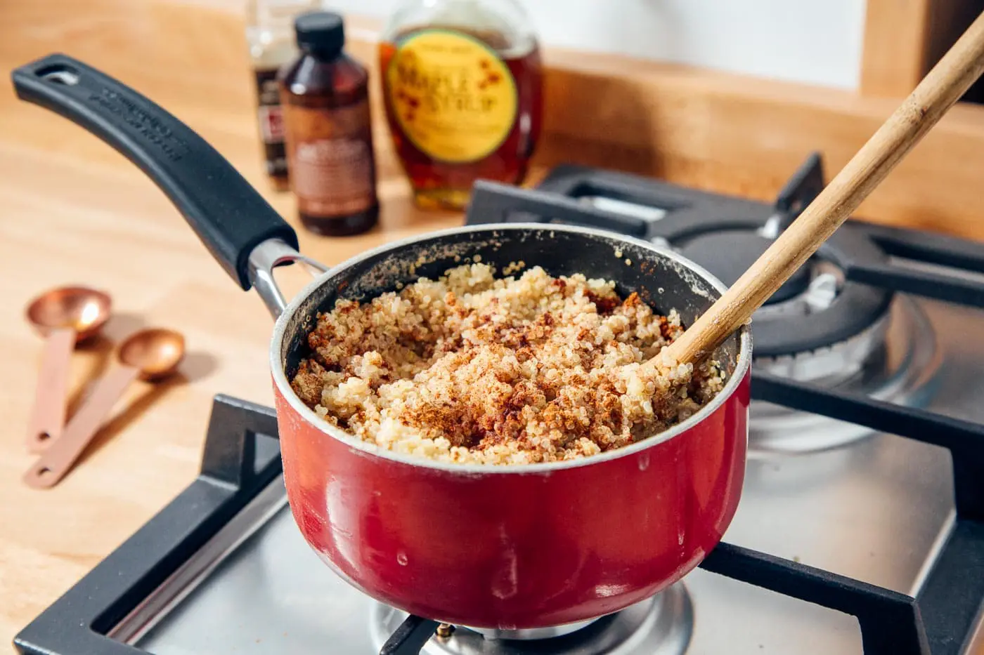 Quinoa cooking in a pot on a stove
