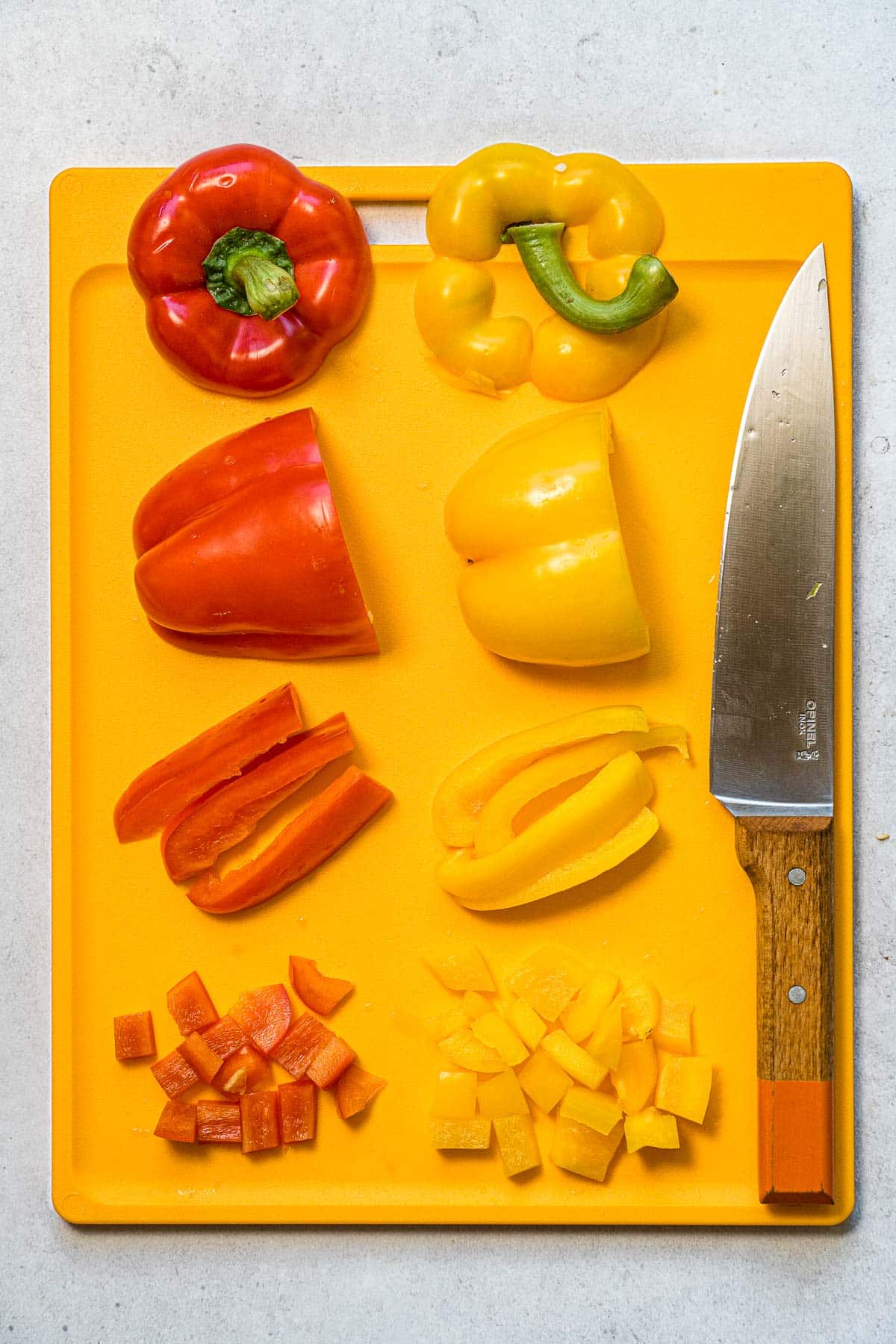Sliced bell pepper on a yellow cutting board