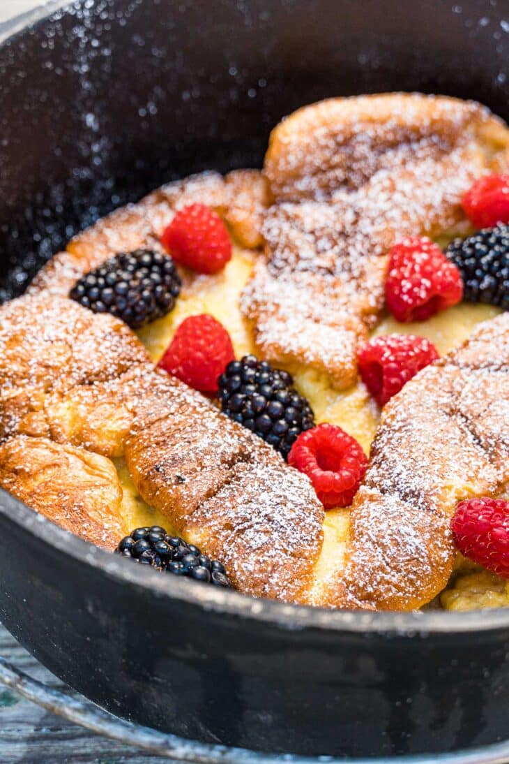Dutch Baby pancake with powdered sugar and berries