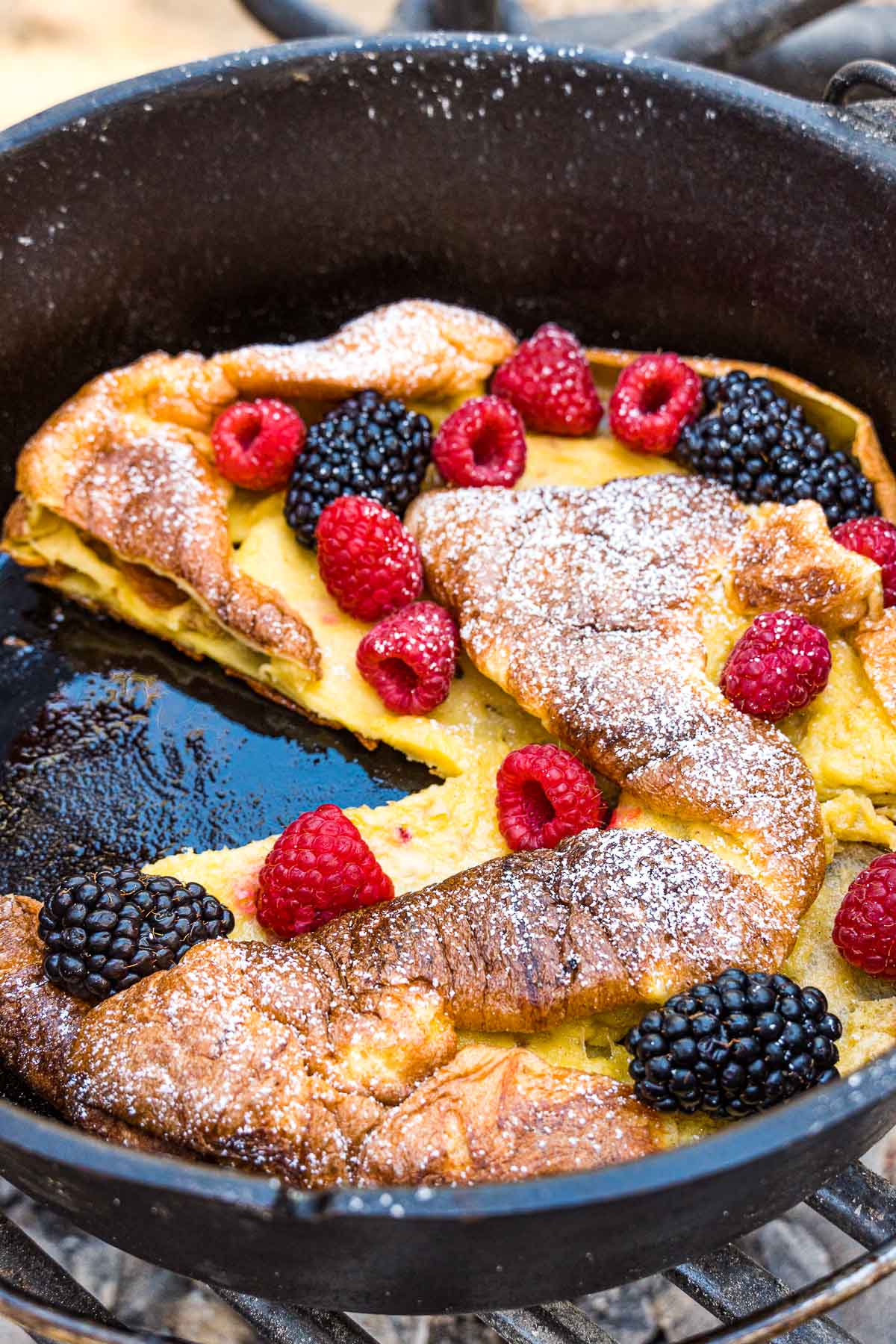 Dutch baby with a slice cut out