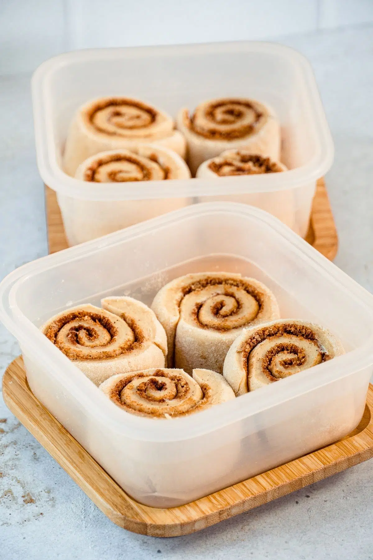 Cinnamon rolls in containers ready for storage