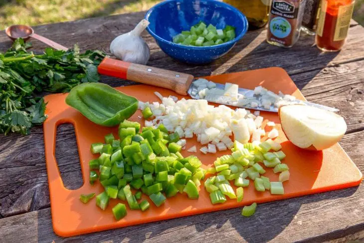 The Holy Trinity of vegetables: onions, green bell peppers, and celery.