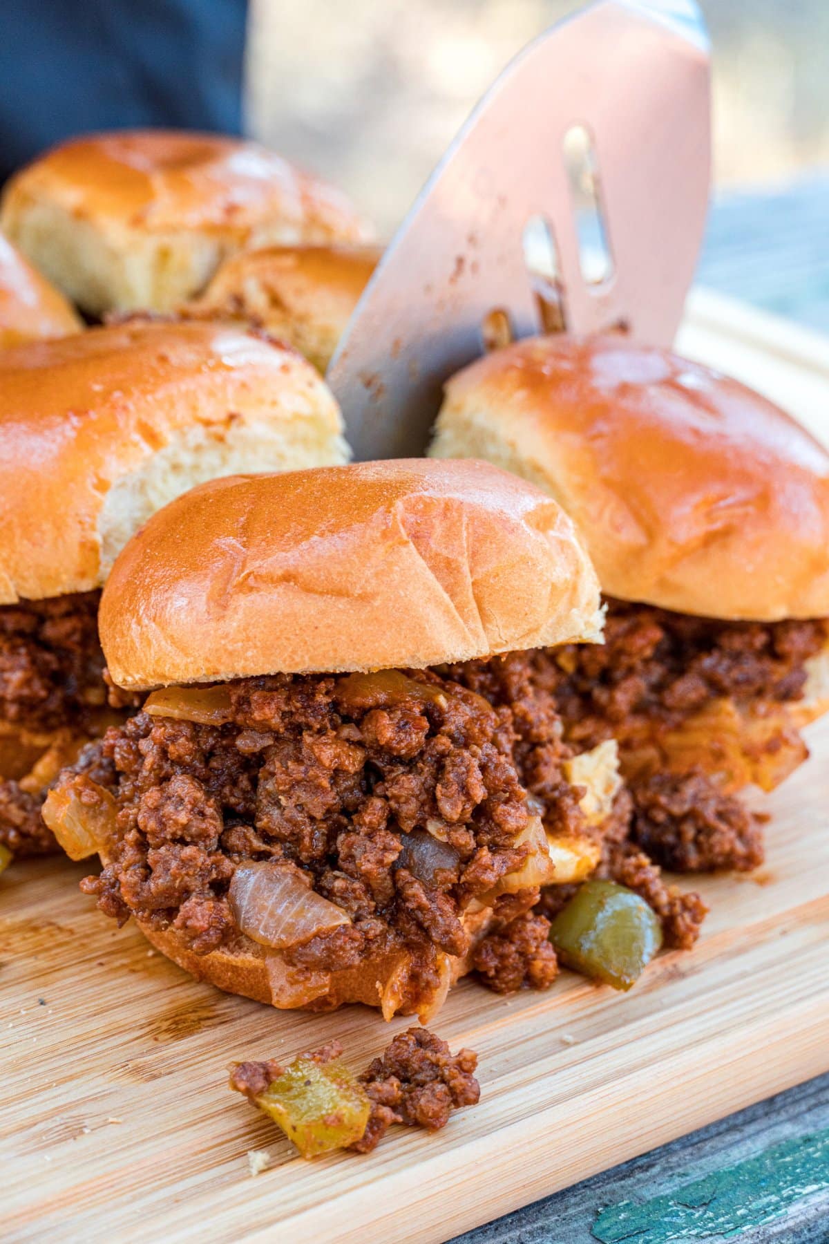 Sloppy joes on a board.