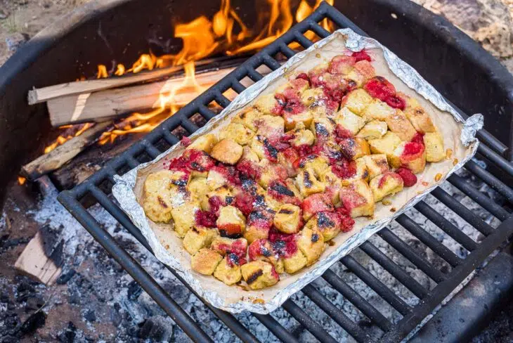 Foil packet french toast on a campfire grill