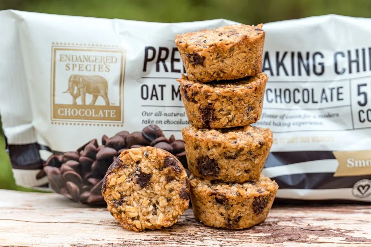Granola bites stacked next to a package of Endangered Species Chocolate Chips