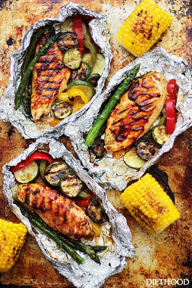 BBQ chicken breast with vegetables in foil.