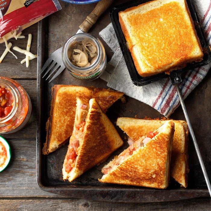 Grilled cheese sandwiches in a pie iron.