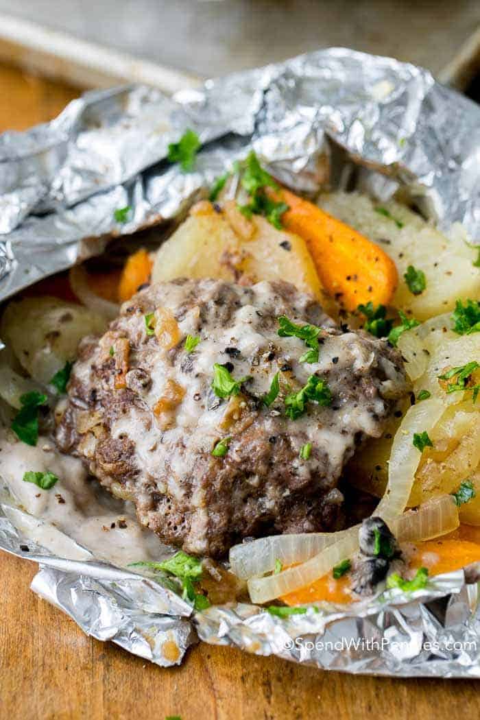 Hamburger in a foil packet with veggies.