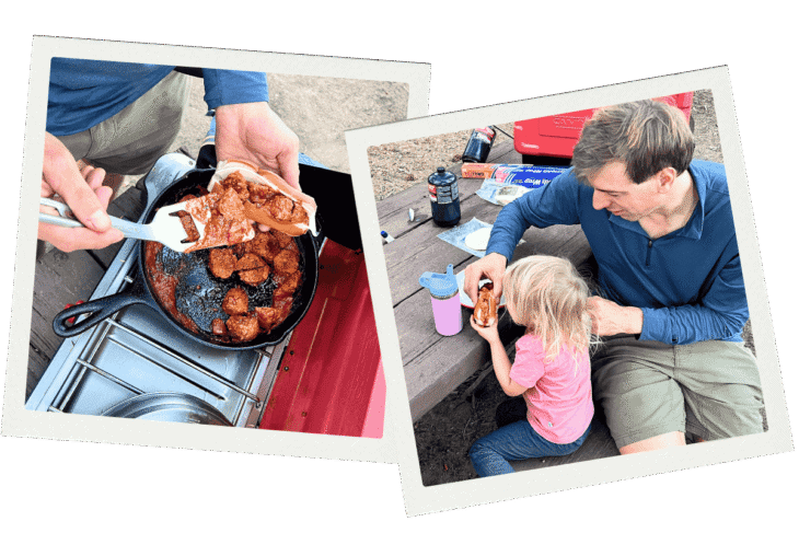 A person cooks meatballs in a skillet on a camping stove, then sits at a picnic table with a child, with gear and water bottle nearby.