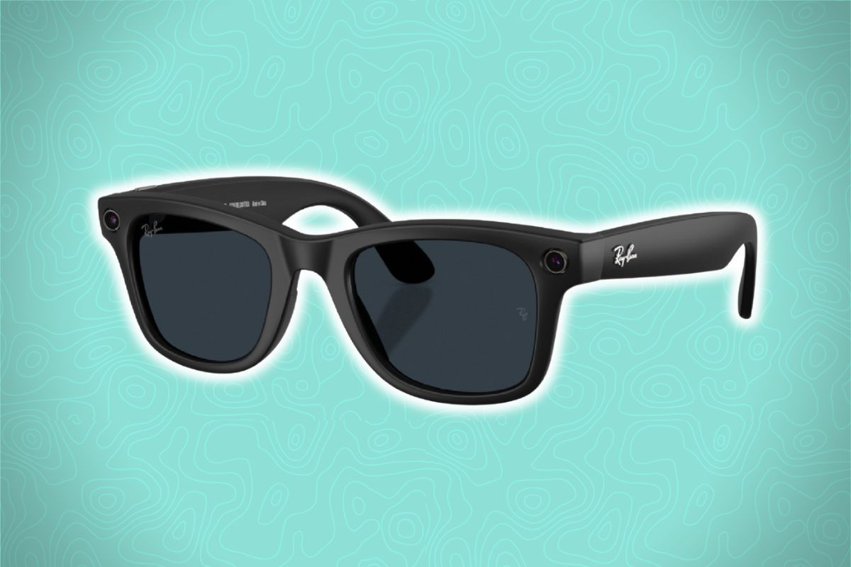 A pair of black Ray-Ban sunglasses with dark lenses sits on a turquoise background with abstract wavy lines.