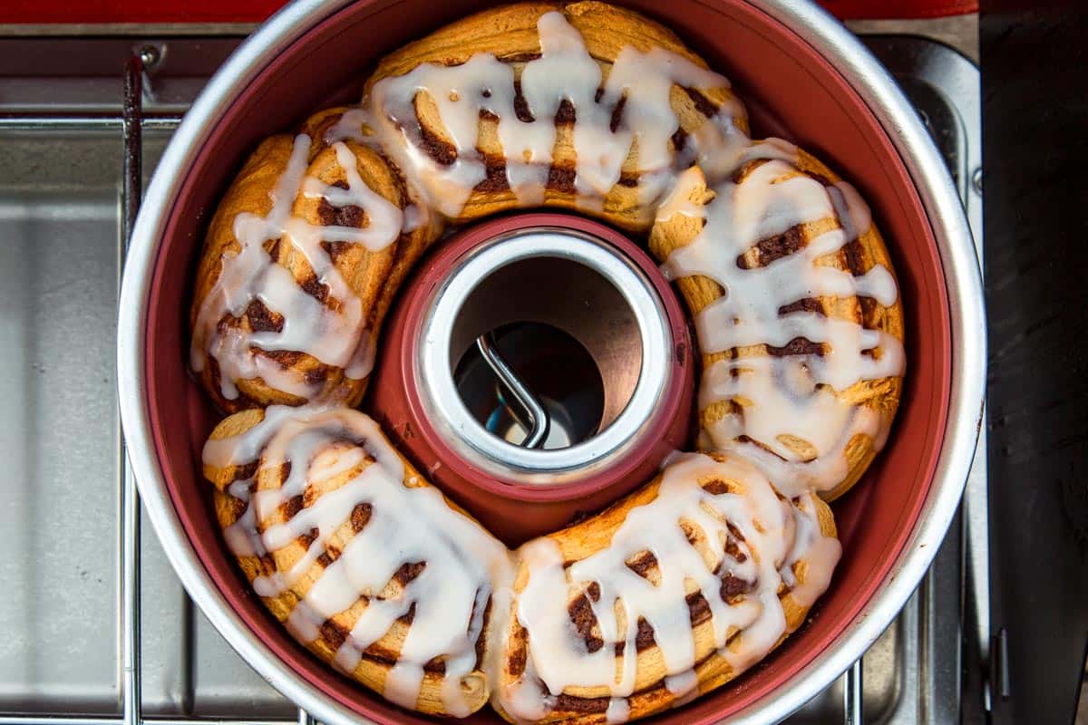 Cinnamon rolls with frosting in an omnia oven