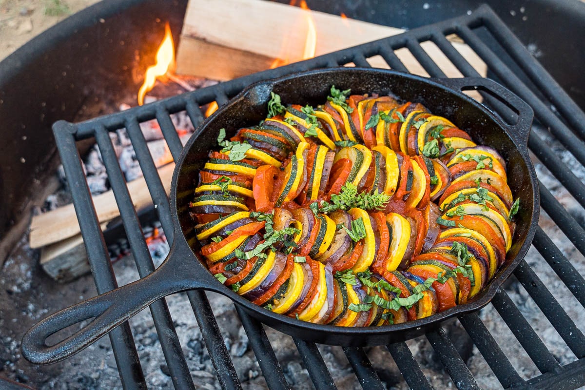 Ratatouille in a frying pan over a fire