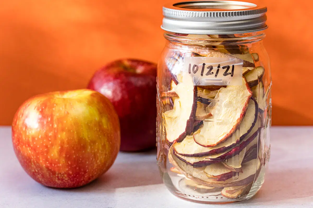 Dehydrated apples in a mason jar for storage