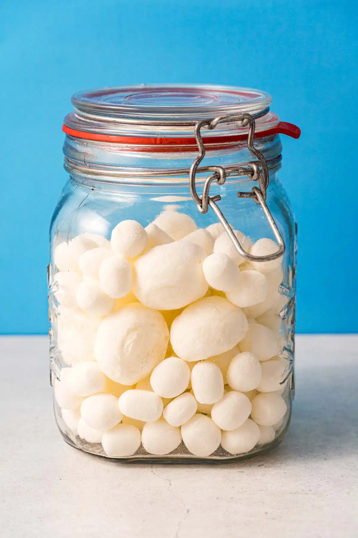 Dehydrated marshmallows in an airtight jar for storage.
