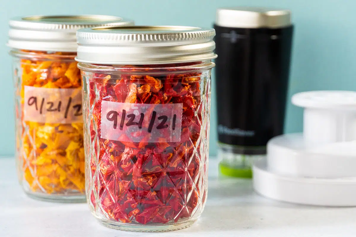 Red bell peppers in a glass jar