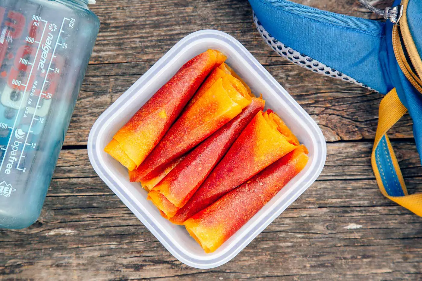 Mango strawberry fruit leathers in a container