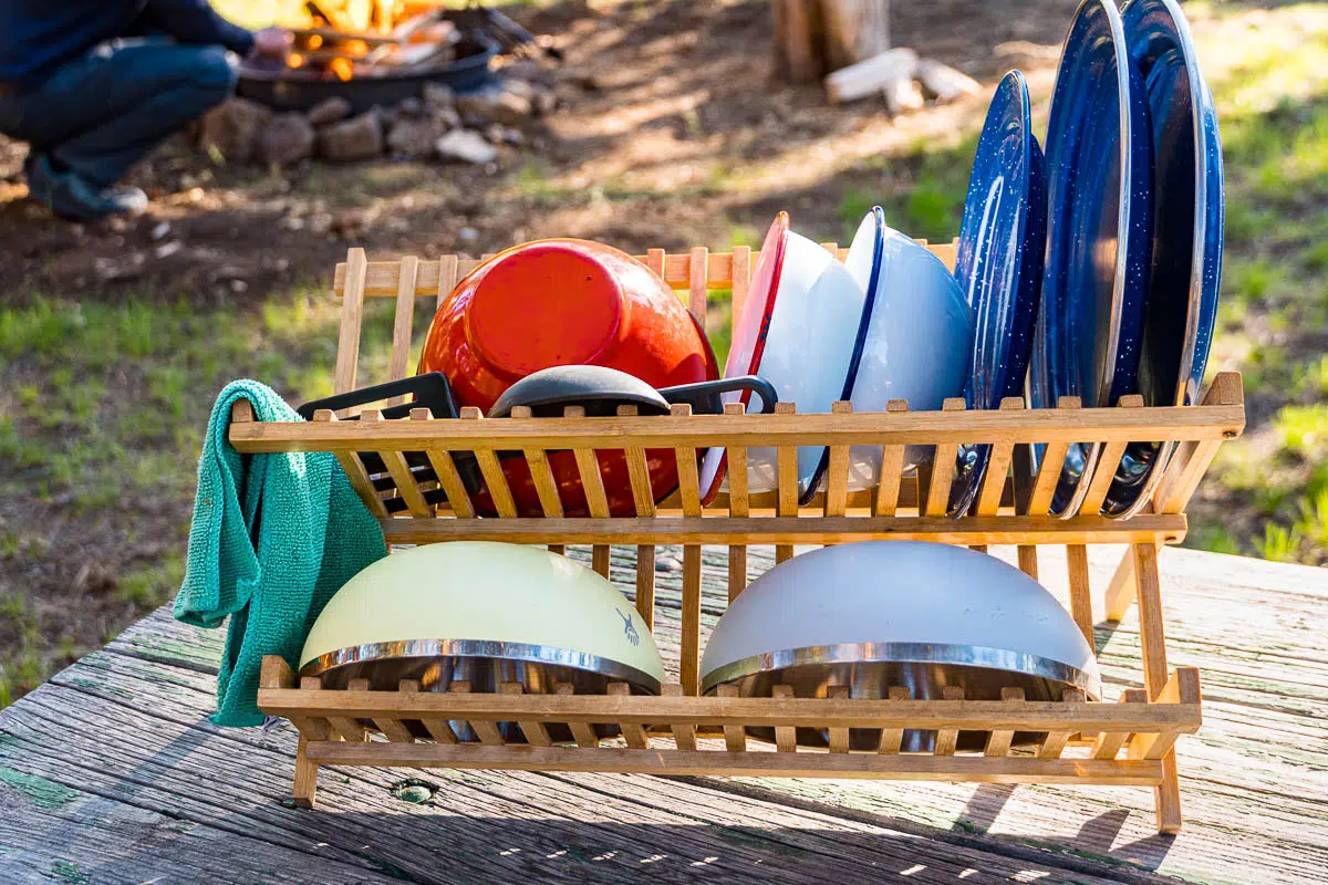 Clean camping dishes on a drying rack