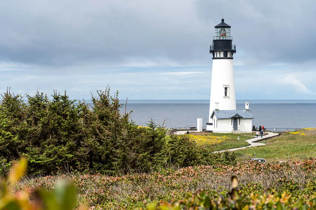 The Yaquina Head Lighthouse on a grassy bluff