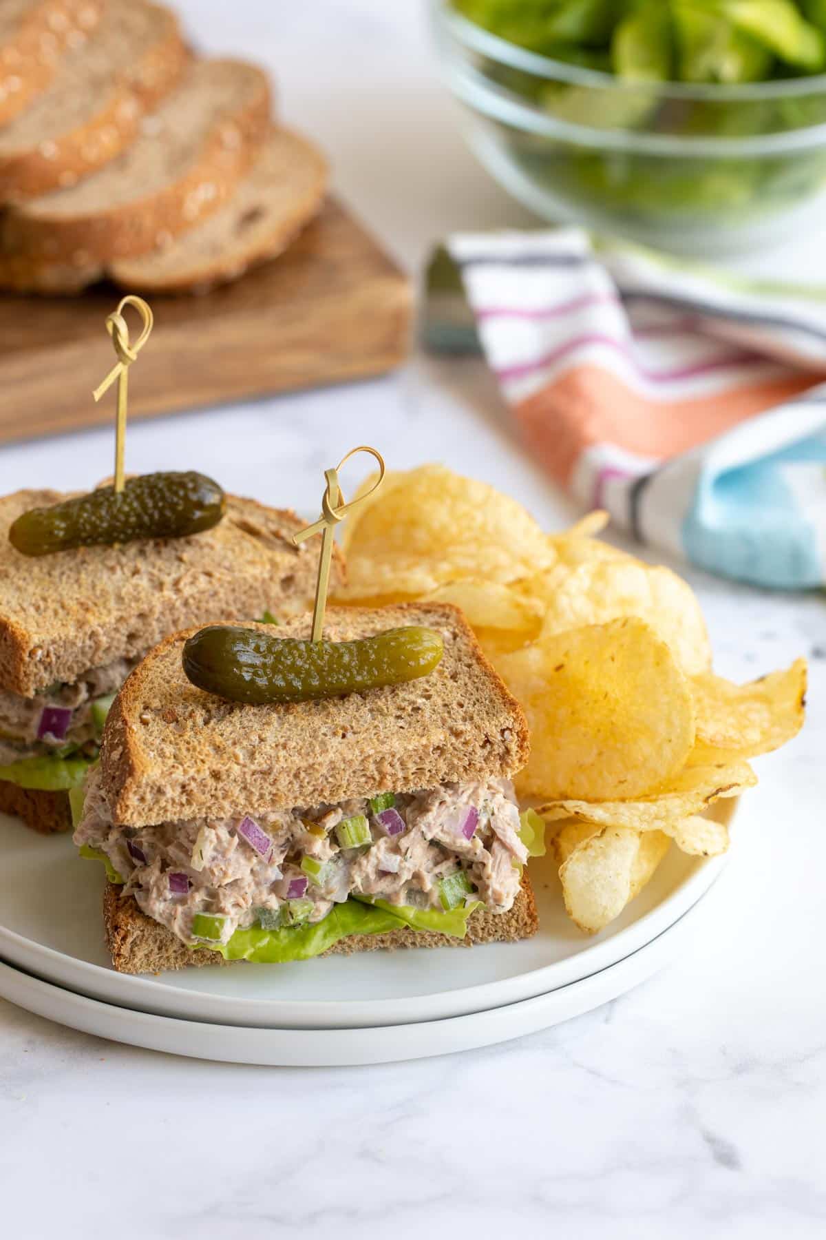 Tuna salad sandwiches on a plate.
