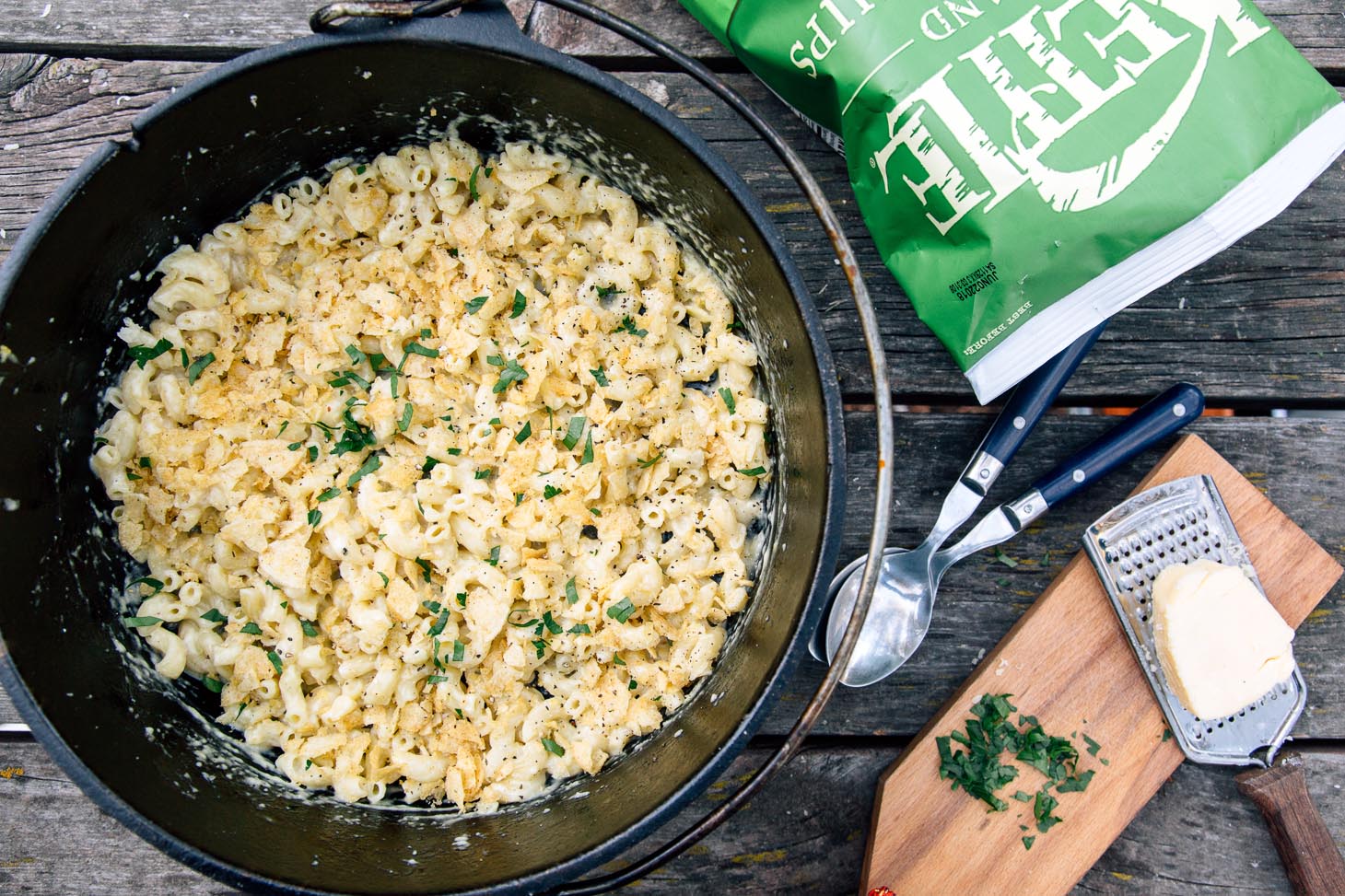 Mac and cheese in a Dutch oven on a picnic table