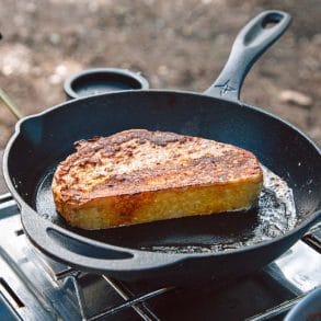 A piece of French toast in a cast iron skillet